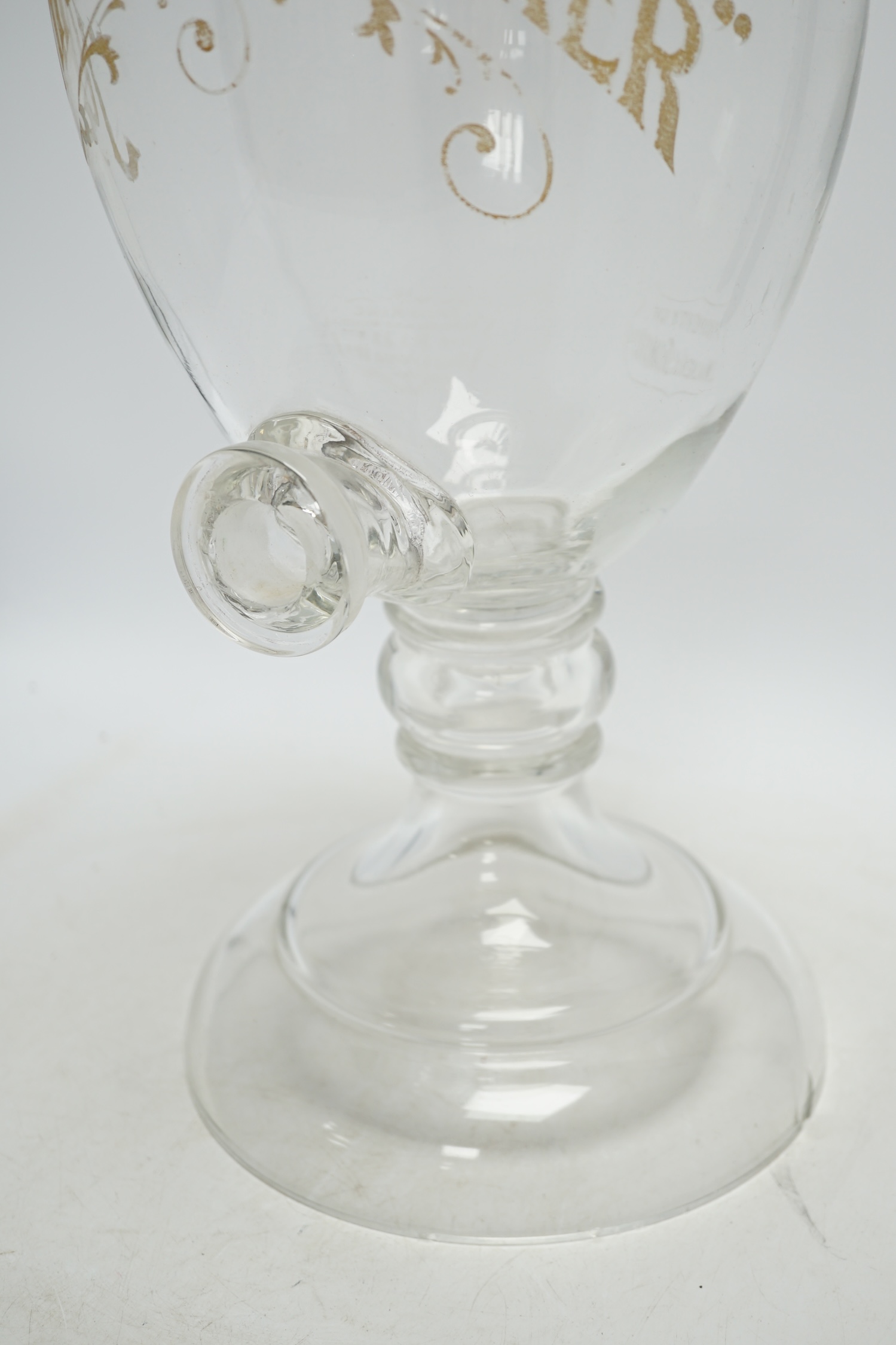 A Johnnie Walker glass advertising shop display whisky urn and cover, 65cm high. Condition - poor